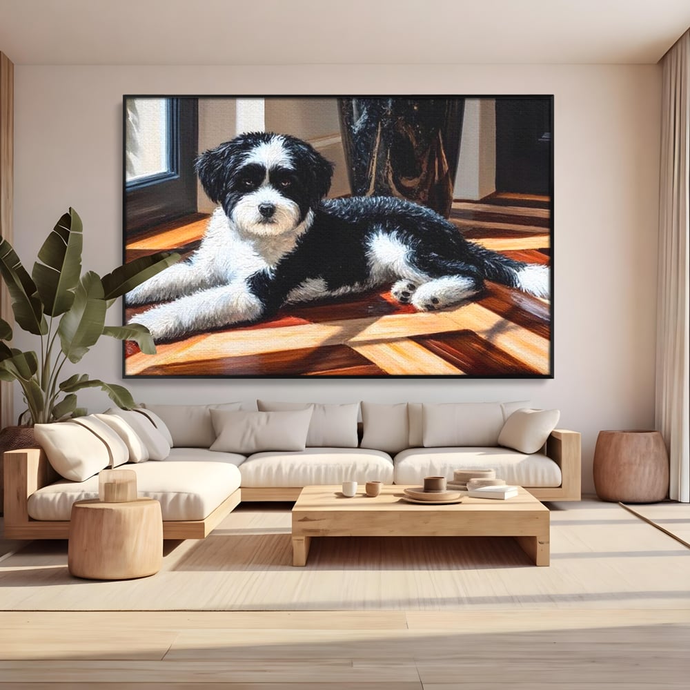 Tablou canvas cu tablou canvas cu catel negru cu alb, in rama de aluminiu negru, pe perete intr-un living
